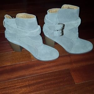 Tan ankle shoes with buckles on the side